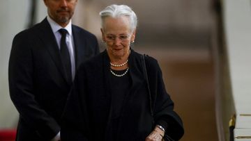 Denmark&#x27;s Queen Margrethe pays her respect to the coffin of Queen Elizabeth II, following her death, during her lying-in-state at Westminster Hall.