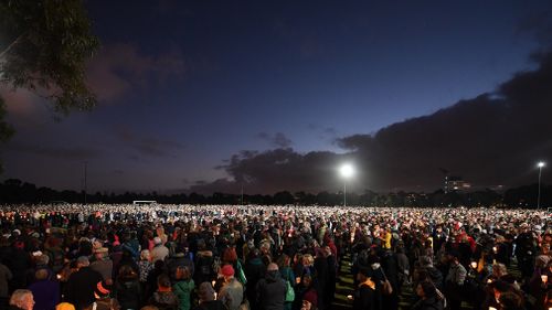 Touching scenes at Princes Park on the night of the vigil for Ms Dixon.