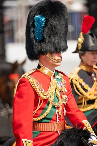 LONDON, ENGLAND - JUNE 02: Prince William, Duke of Cambridge, in his role as Colonel of the Irish Guards, rides his horse along the Mall during the Royal Procession ahead of the Trooping the Colour parade on June 2, 2022 in London, England. Trooping The Colour, also known as The Queen's Birthday Parade, is a military ceremony performed by regiments of the British Army that has taken place since the mid-17th century. It marks the official birthday of the British Sovereign. This year, from June 2 