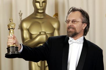 Jan. A.P. Kaczmarek poses with the Oscar for best original score for his work on Finding Neverland.