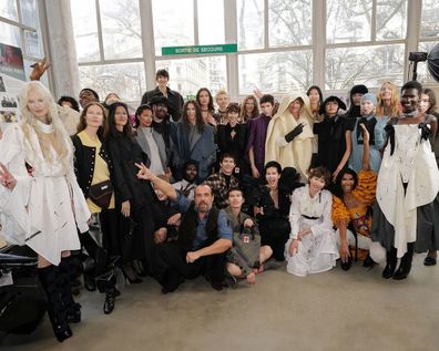 Sam Smith alongside Vivienne Westwood's models 