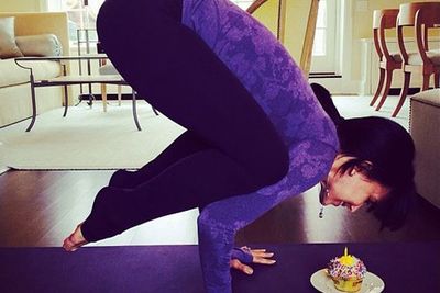 What's a birthday celebration without a crow pose? Oh, and a cupcake?