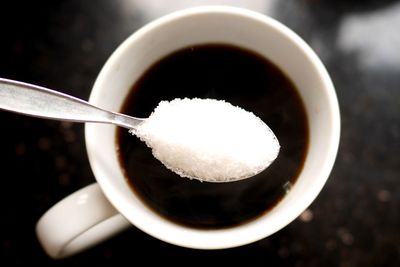 A teaspoon of sugar is about 4g