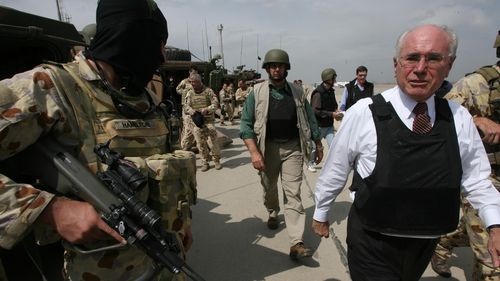 Then-Australian prime minister John Howard pays a surprise visit to Baghdad, Iraq in 2007. 