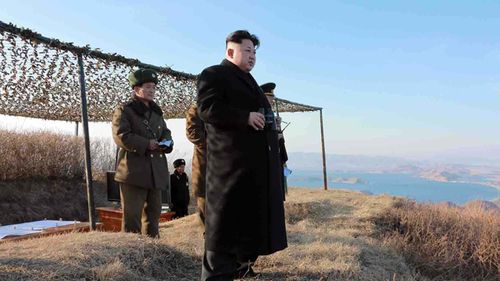 North Korean leader Kim Jong-Un inspects a large-caliber multiple rocket launching system