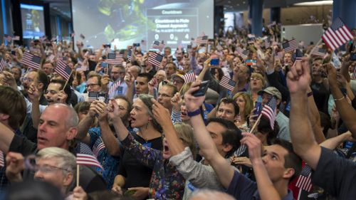 New Horizons staff at Johns Hopkins Applied Physics Laboratory in Maryland. (AAP)