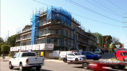 A worker has did on a construction site in Perth's inner north.