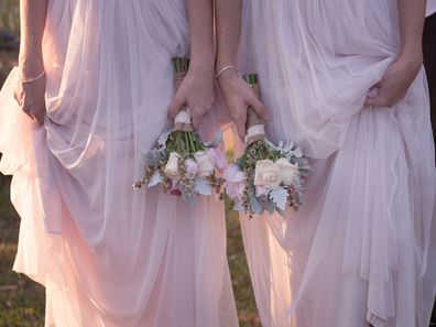 Bridesmaids standing together