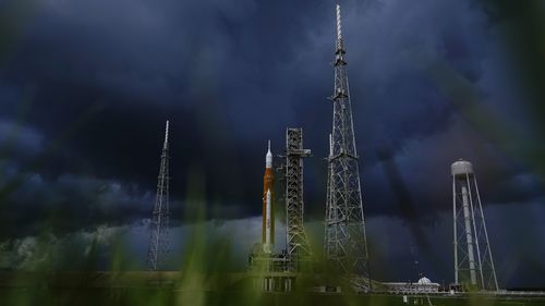 The NASA moon rocket stands on Pad 39B before the Artemis 1 mission to orbit the moon at the Kennedy Space Center, Friday, Sept. 2, 2022, in Cape Canaveral, Fla. (AP Photo/Brynn Anderson)