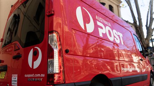 Australia post delivery truck at The Rocks street. Sydney, NSW, Australia. 03 August 2021.