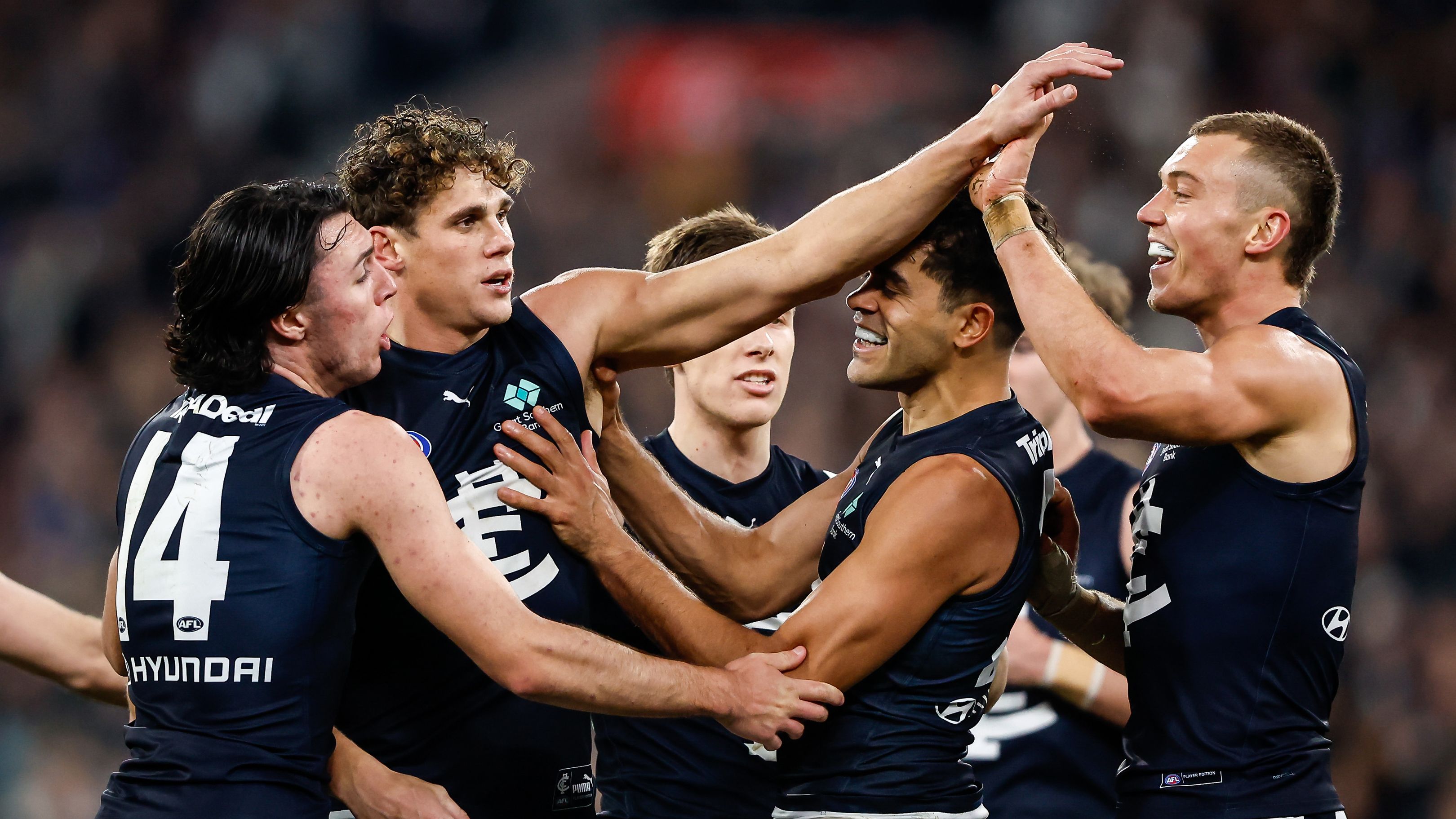 MELBOURNE, AUSTRALIA - JULY 28: Charlie Curnow of the Blues celebrates a goal with teammates during the 2023 AFL Round 20 match between the Collingwood Magpies and the Carlton Blues at The Melbourne Cricket Ground on July 28, 2023 in Melbourne, Australia. (Photo by Dylan Burns/AFL Photos via Getty Images)