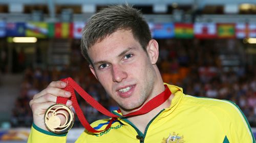 Gold medallist Daniel Fox during the medal ceremony, after his victory in the men’s para-sport 200m freestyle in Glasgow.