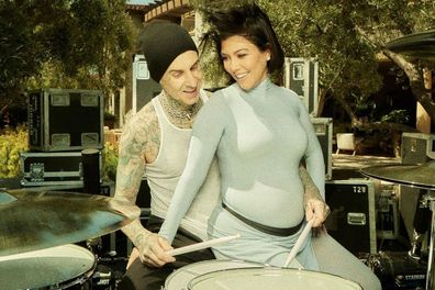 Kourtney Kardashian and Travis Barker, pictured at their gender reveal, have hinted their unborn son might be named Rocky.