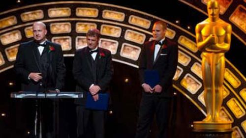 Rory McGregor, Neil Wilson and Alan Rogers accepting their awards. (Rising Sun Pictures)