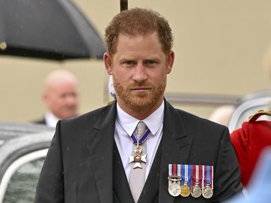 Prince Harry arrives for the coronation of King Charles at Westminster Abbey, London