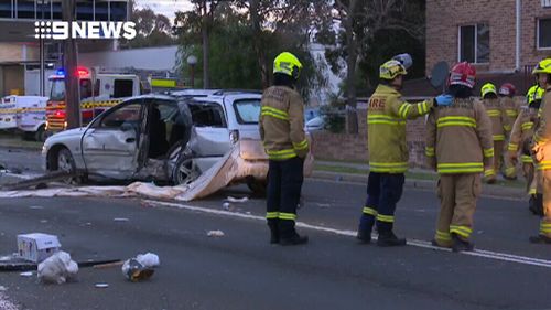 Police are now searching for three other occupants of the car who fled the crash. (9NEWS)