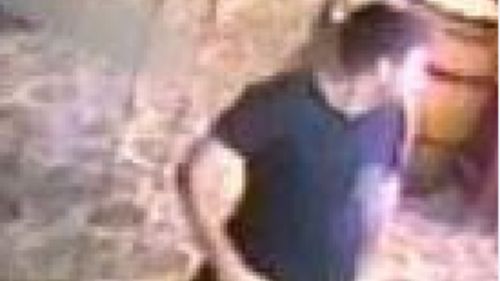 Investigators would like to speak to the man in the black t-shirt shown in the CCTV. (Queensland Police)