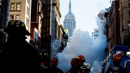 A large cloud rises from a steam explosion in Manhattan, New York City. (AAP)