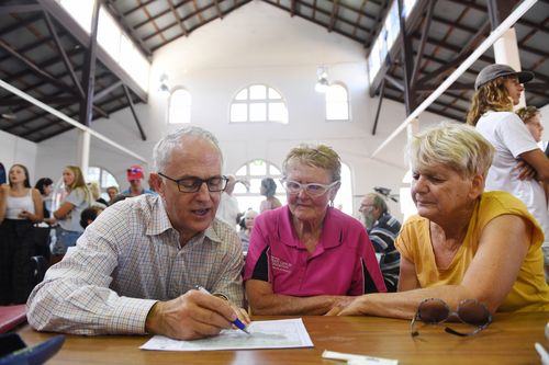 Malcolm Turnbull was in Bega this afternoon, meeting with residents affected by the devastating fires. Picture: AAP