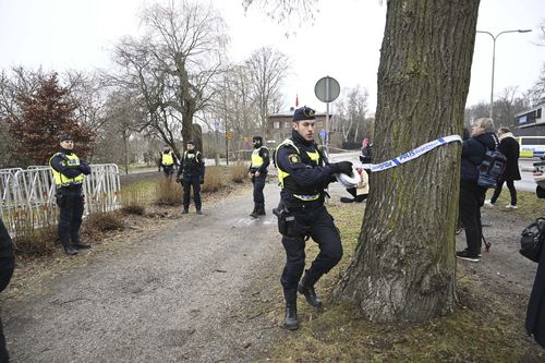 Police cordon off the area outside the Turkish embassy in Stockholm, Sweden, Saturday Jan. 21, 2023. Sweden is bracing for demonstrations that could complicate its efforts to persuade Turkey to approve its NATO accession. A far-right activist from Denmark has received permission from police to stage a protest on Saturday outside the Turkish Embassy, where he intends to burn the Quran, Islams holy book. (Fredrik Sandberg/TT News Agency via AP)