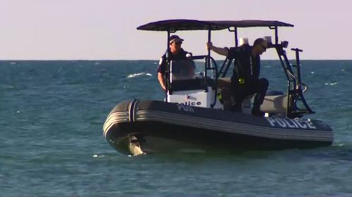 Water police search for a teenage girl missing off an Adelaide beach. (9NEWS)