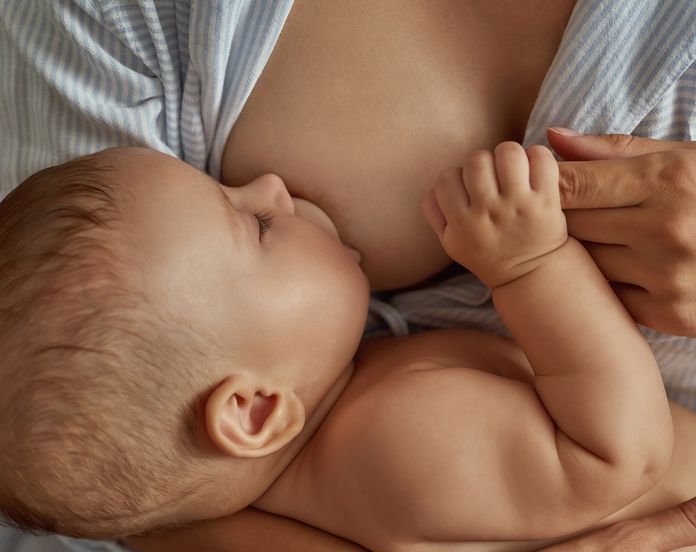 Breast friends: Photo of babysitter mum who breastfeeds her son