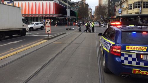 A motorcyclist is in hospital following a crash in Melbourne's CBD. Picture: 9NEWS
