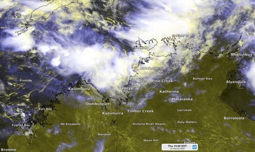 Enhanced visible/infrared satellite image showing cloud building around a developing tropical low to the west of Darwin on Thursday.