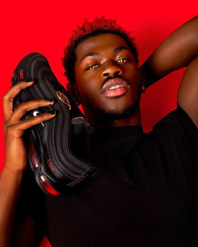 Lil Nas X's unofficial 'Satan' Nikes containing human blood sell out in  under a minute amid lawsuit from sneaker giant - 9Celebrity