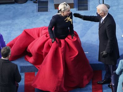 President-elect Joe Biden greets Lady Gaga during the 59th Presidential Inauguration at the U.S. Capitol in Washington, Wednesday, Jan. 20, 2021.