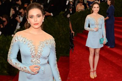 Elizabeth Olsen running late to her ballroom dancing competition. Oh wait, that's her Met Ball gown. Awks.<br/><br/>(Images: Getty)
