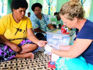 Dr Lucia Romani working with women in the Pacific.