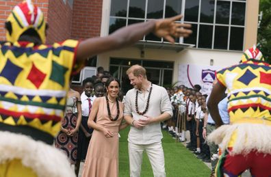 Prince Harry and Meghan visit children at the Lights Academy in Abuja, Nigeria, Friday, May 10, 2024.   
