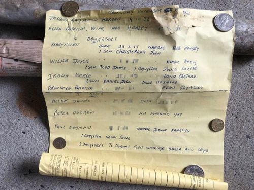 A time capsule with a handwritten note, similar to a family tree, was found under a bathtub in Ballina during renovations.