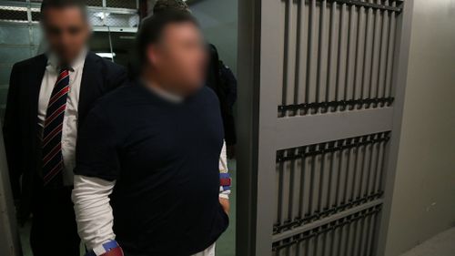 Australian Federal Police arrested 18 people in raids across Sydney last month. (AFP)