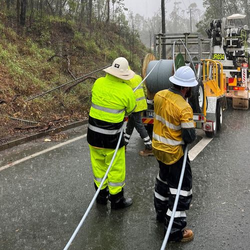 Crews work to restore power and downed lines across South East Queensland.
