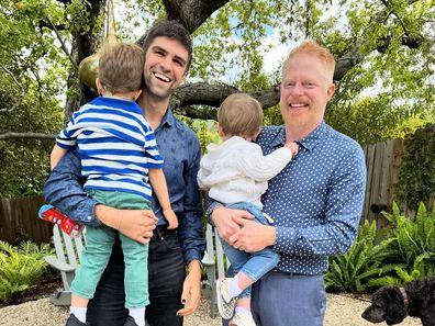 Jesse Tyler Ferguson and Justin Mikita with their two sons.