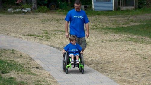 Paralysed boy granted simple wish of a new backyard path