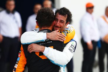 Race winner Lando Norris of Great Britain and McLaren celebrates with Daniel Ricciardo of Australia and Visa Cash App RB in parc ferme after the F1 Grand Prix of Miami at Miami International Autodrome on May 05, 2024 in Miami, Florida. (Photo by Mark Thompson/Getty Images)