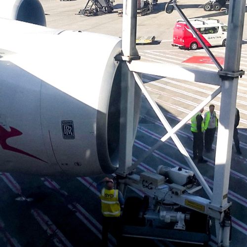 Qantas airbridge crashes into plane engine