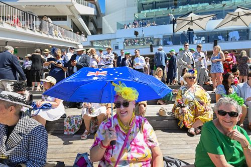 Cup fans enjoy a sunny day at Flemington. Joan McBride