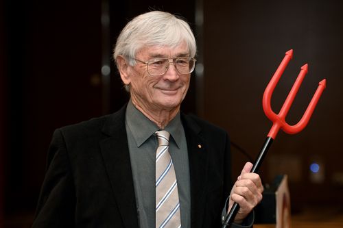 Dick Smith reprises the Grim Reaper AIDS advert at his press conference today.