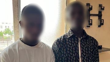 The two Nigerian men arrested and charged over the alleged sextortion attempt.
