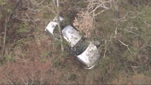Car slides 80m down hill at Queensland lookout