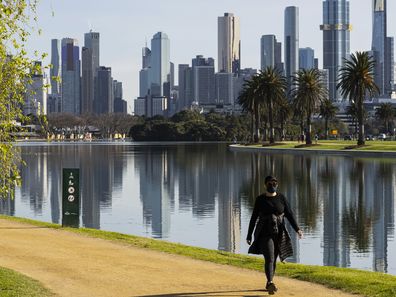 People exercising at Albert Park Lake  in Melbourne