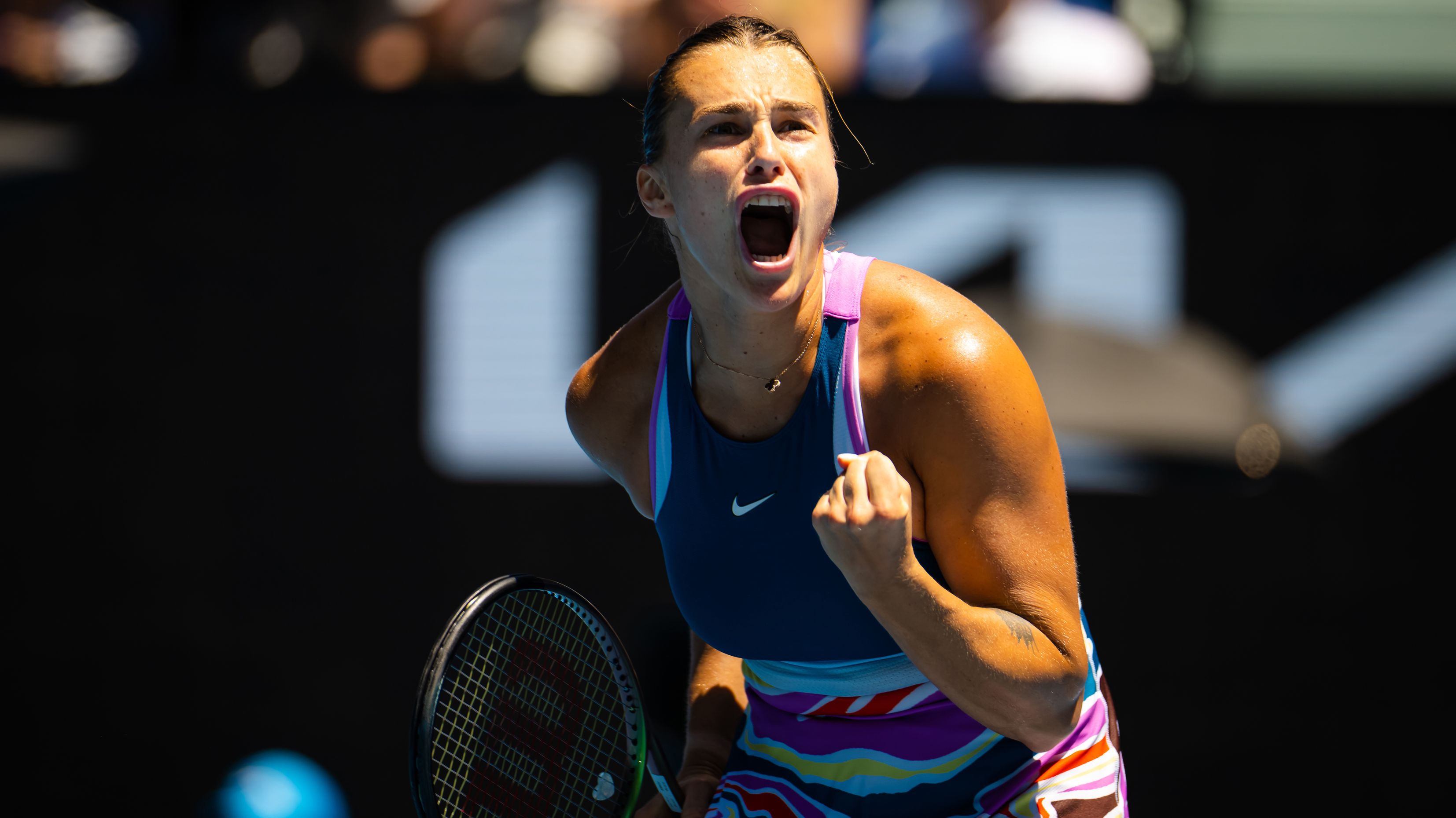 MELBOURNE, AUSTRALIA - JANUARY 23: Aryna Sabalenka of Belarus in action against Belinda Bencic of Switzerland during her fourth round match on Day 8 of the 2023 Australian Open at Melbourne Park on January 23, 2023 in Melbourne, Australia (Photo by Robert Prange/Getty Images)