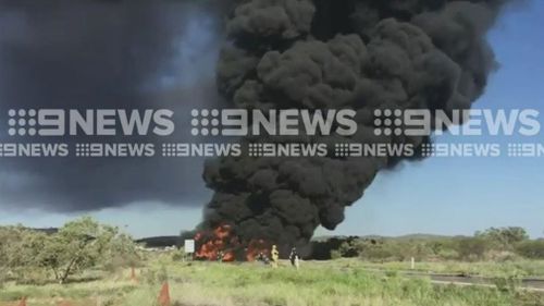 The tanker is spewing black smoke. (9NEWS)