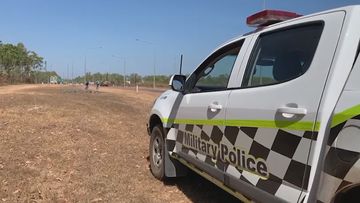 NT military police at the scene of a crash in Howard Springs, Darwin.
