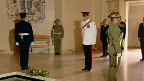 Harry observed a moment's silence after laying the wreath. (9NEWS)