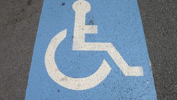 Queenslanders who park in disabled car spaces could soon find themselves slapped with a demerit point penalty as well as cash fine. 